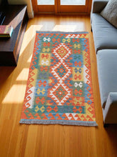 Green Turkish Rug: Bohemian Wool Floor Mat with Ethnic Design