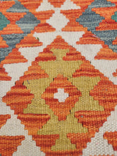 Green Turkish Rug: Bohemian Wool Floor Mat with Ethnic Design